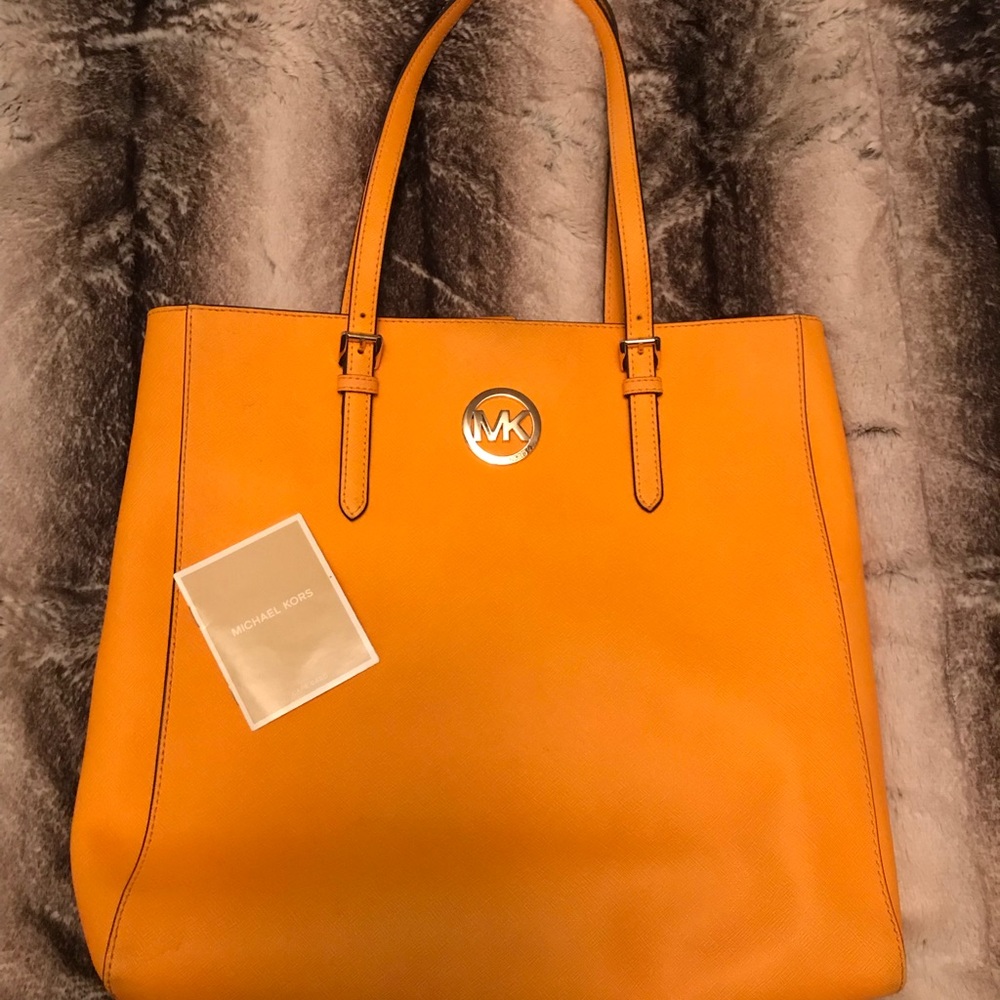 Large mustard yellow Michael Kors purse